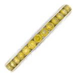 A platinum 'yellows' diamond full eternity ring.Estimated total 'yellow' diamond weight 0.80ct.