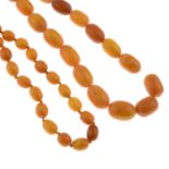 Two amber single-strand necklaces.Amber beads measuring 18 to 8mms.
