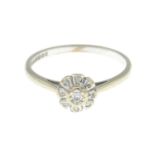 An 18ct gold diamond cluster ring.Hallmarks for 18ct gold.