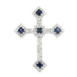 A sapphire and diamond cross pendant.Estimated total diamond weight 0.85ct.