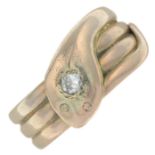 An early 20th century 9ct gold snake ring, with diamond crest.Estimated diamond weight 0.10ct.