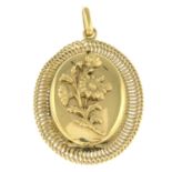 A floral locket pendant.