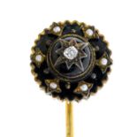 An old-cut diamond, split pearl and enamel stickpin.Length of stickpin head 1.3cms.