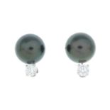 A pair of diamond and cultured pearl earrings.Estimated total diamond weight 0.40ct,