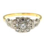 A diamond cluster ring.Estimated total diamond weight 0.30ct,
