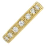 An 18ct gold brilliant-cut diamond half eternity ring.Estimated total diamond weight 0.40ct,