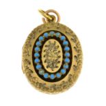 An engraved locket, with blue enamel highlights.