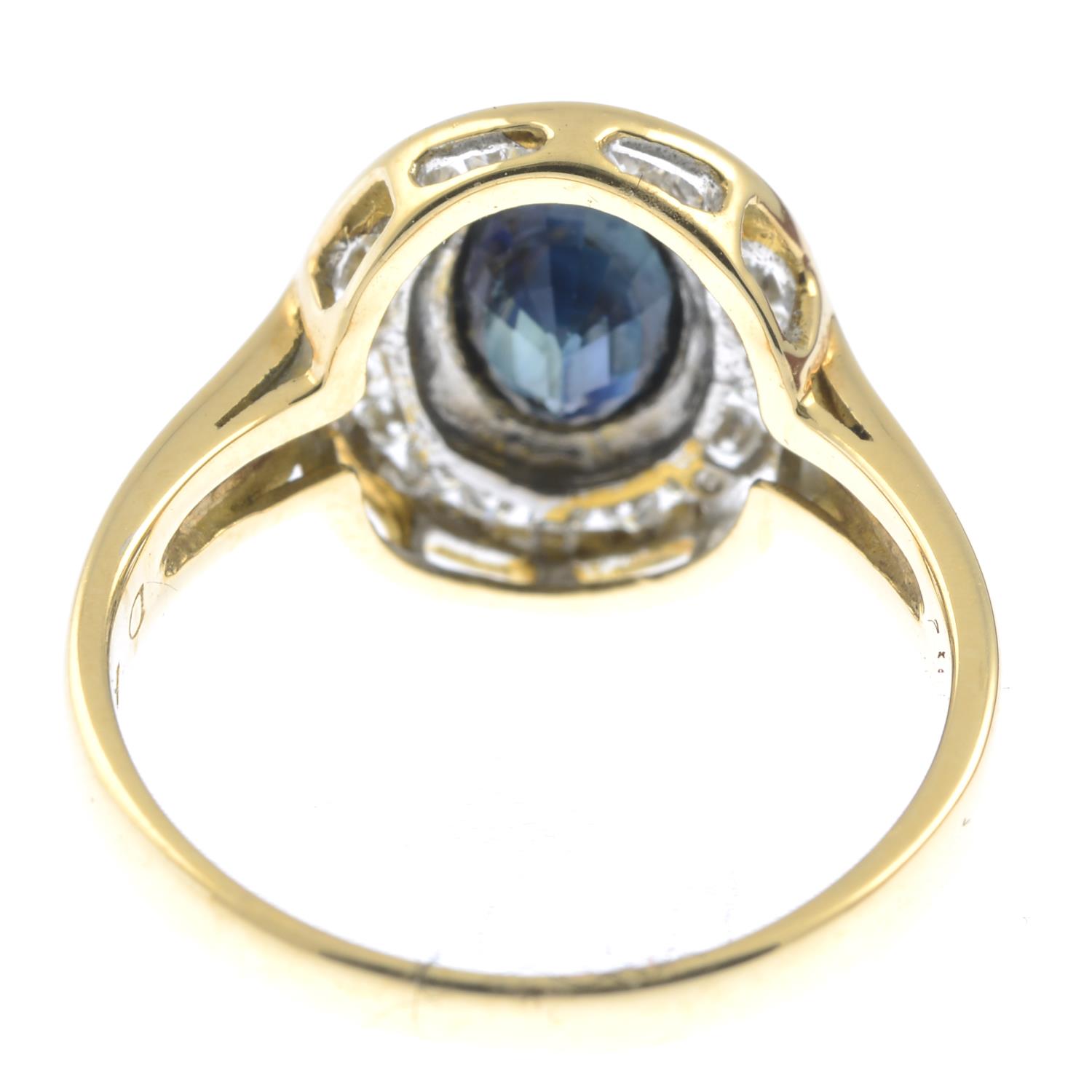 An sapphire and brilliant-cut diamond cluster ring.Estimated total diamond weight 0.20ct.Stamped - Image 2 of 2