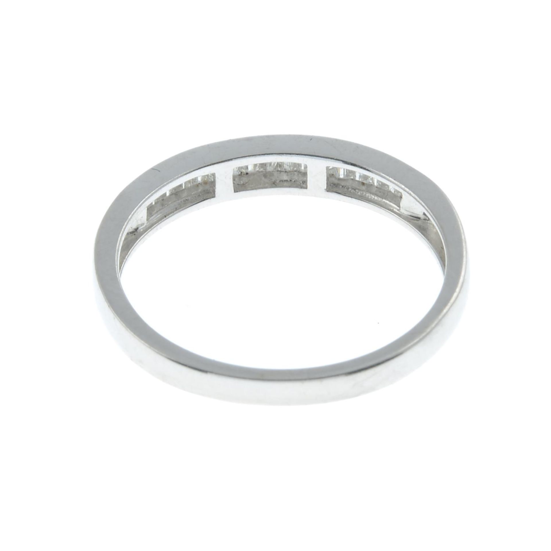 A diamond half eternity ring.Total diamond weight 0.25ct, stamped to band. - Image 2 of 2
