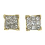 A pair of 18ct gold diamond stud earrings.Estimated total diamond weight 0.20ct.