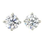 A pair of diamond stub earrings.Estimated total diamond weight 0.40ct, H-I colour, VS clarity.
