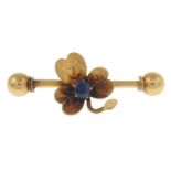 A sapphire foliate brooch.Length 3.8cms.