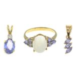 9ct gold tanzanite three-stone pendant, hallmarks for 9ct gold, length 1.6cms, 0.5gm.