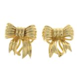 A pair of bow earrings.