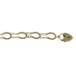 A 9ct gold horseshoe-link bracelet,