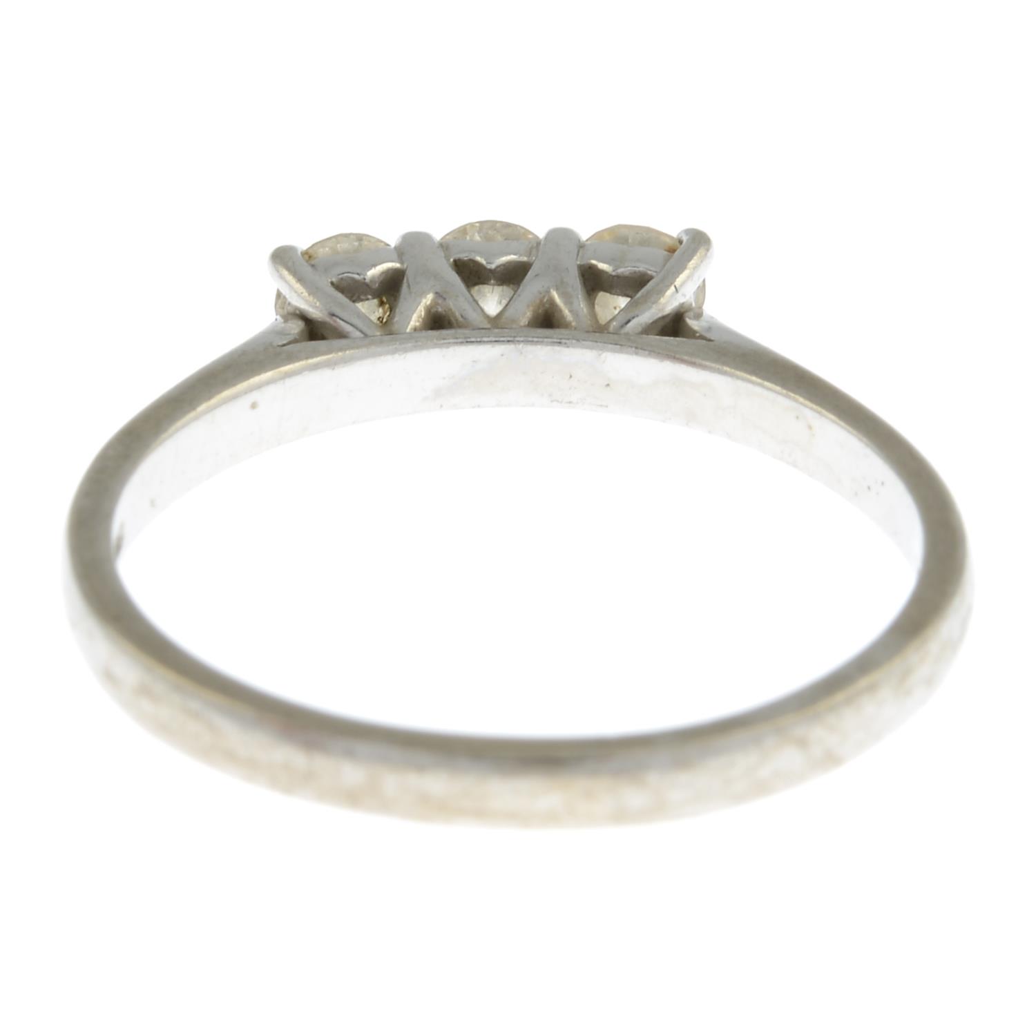 An 18ct gold brilliant-cut diamond three-stone ring.Estimated total diamond weight 0.45ct, - Image 2 of 3