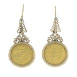 A pair of 9ct gold drop earrings, each with a half sovereign.Sovereigns dated 1906.