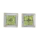 A pair of peridot quatrefoil stud earrings.