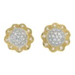 A pair of cubic zirconia cluster earrings.