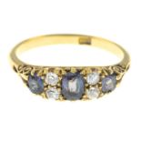An early 20th century 18ct gold alexandrite and diamond dress ring.Alexandrite with report 08444,