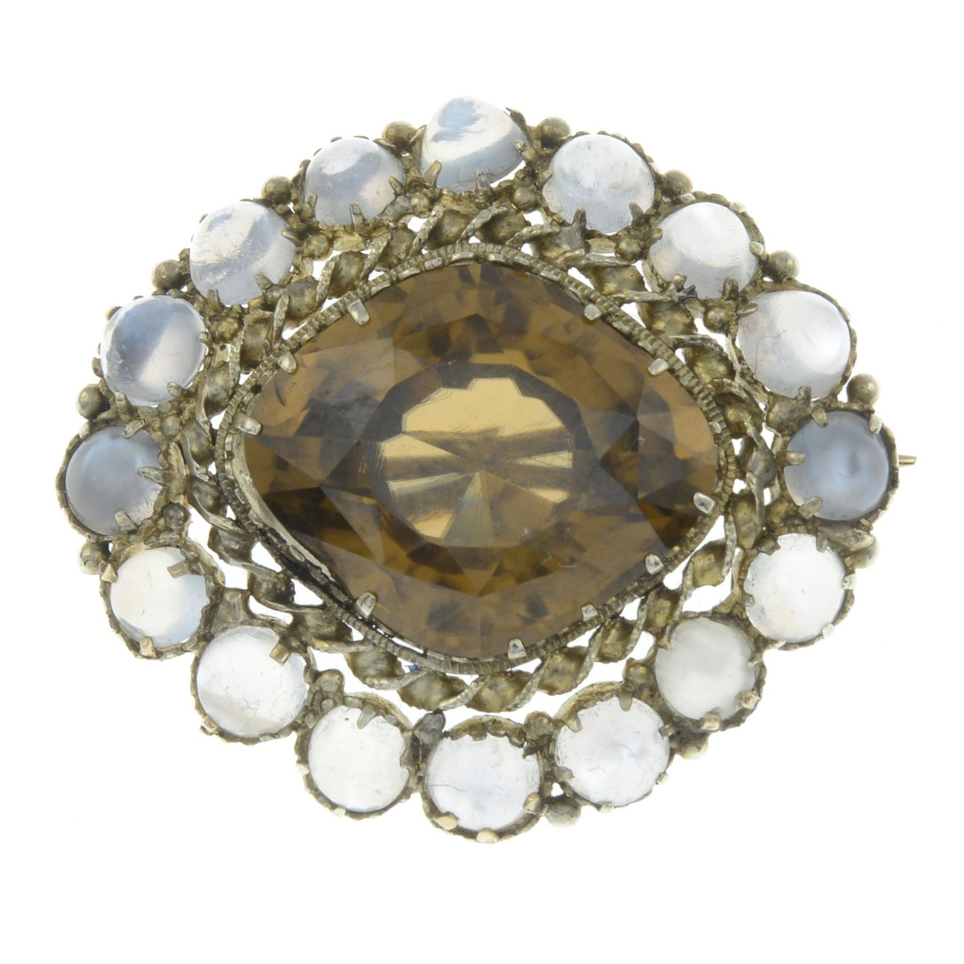A yellow zircon and moonstone cluster brooch.Length 3.3cms.