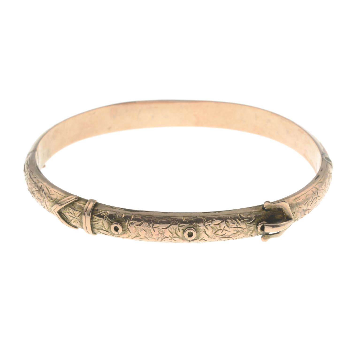 An Edwardian 9ct gold bangle,