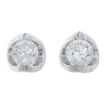 A pair of 18ct gold diamond stud earrings.Estimated total diamond weight 0.45ct,