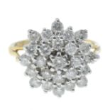 An 18ct gold brilliant-cut diamond cluster ring.Estimated total diamond diamond weight 1.15cts.