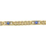 A 9ct gold brick-link bracelet, with blue and colourless paste highlights.Hallmarks for 9ct gold.