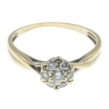 A brilliant-cut diamond cluster ring.Estimated total diamond weight 0.20ct.Ring size L1/2.