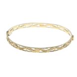 A 9ct gold openwork bangle.Hallmarks for 9ct gold.