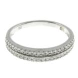 An 18ct gold single-cut diamond two row half eternity ring.Estimated total diamond weight