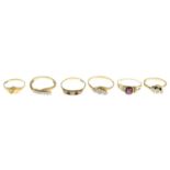 Six rings, to include two 9ct gold diamond three-stone rings.