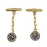 A pair of sapphire cufflinks.Marked 18K.