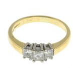 An 18ct gold square-shape diamond three-stone ring.Estimated total diamond weight 0.45ct,