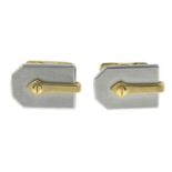 A pair of 18ct gold and steel bi-colour cufflinks.Hallmarks for 18ct gold.