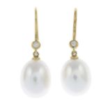 A pair of cultured pearl and diamond earrings.Approximate dimensions of one cultured pearl 11.2 by