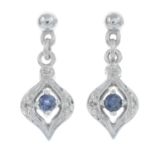 A pair of sapphire drop earrings, with diamond accent.Length 1.7cms.