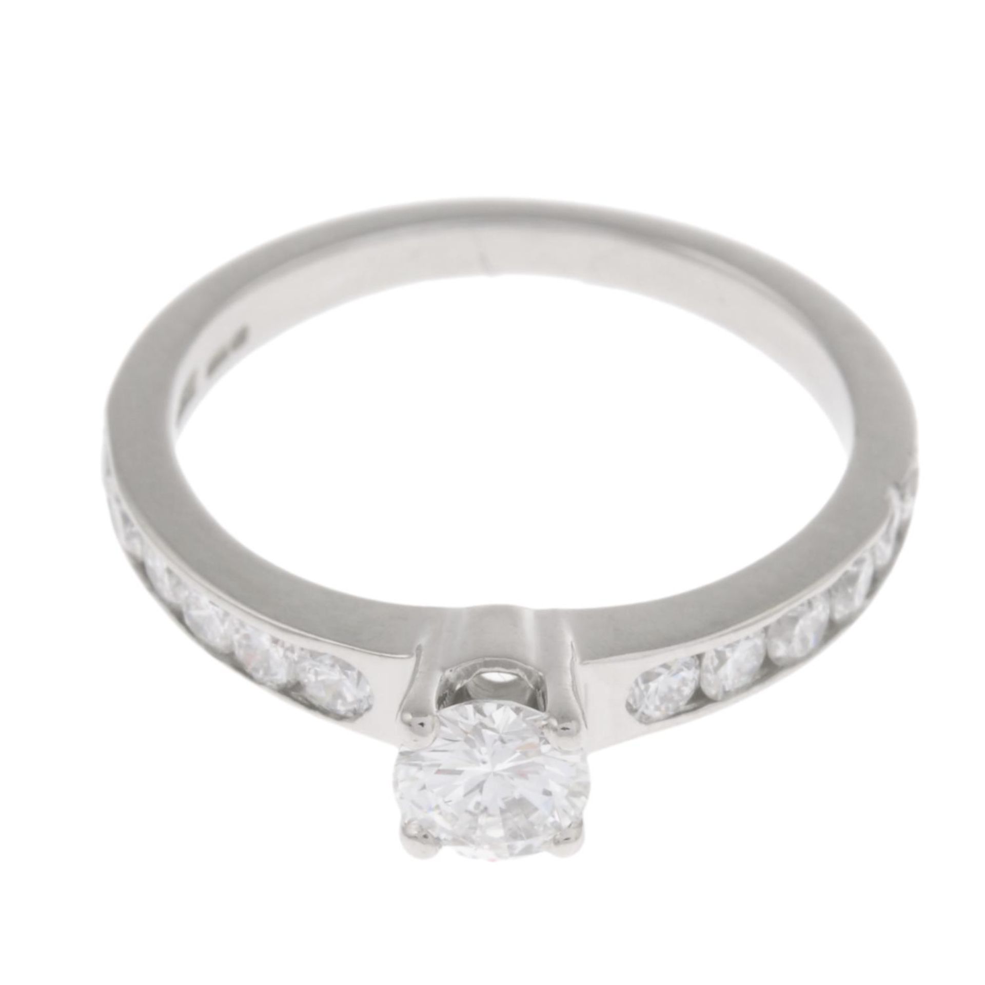 A platinum brilliant-cut diamond single-stone ring,