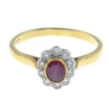 An 18ct gold ruby and diamond cluster ring.Estimated total diamond weight 0.20ct.