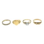 Four 9ct gold rings.