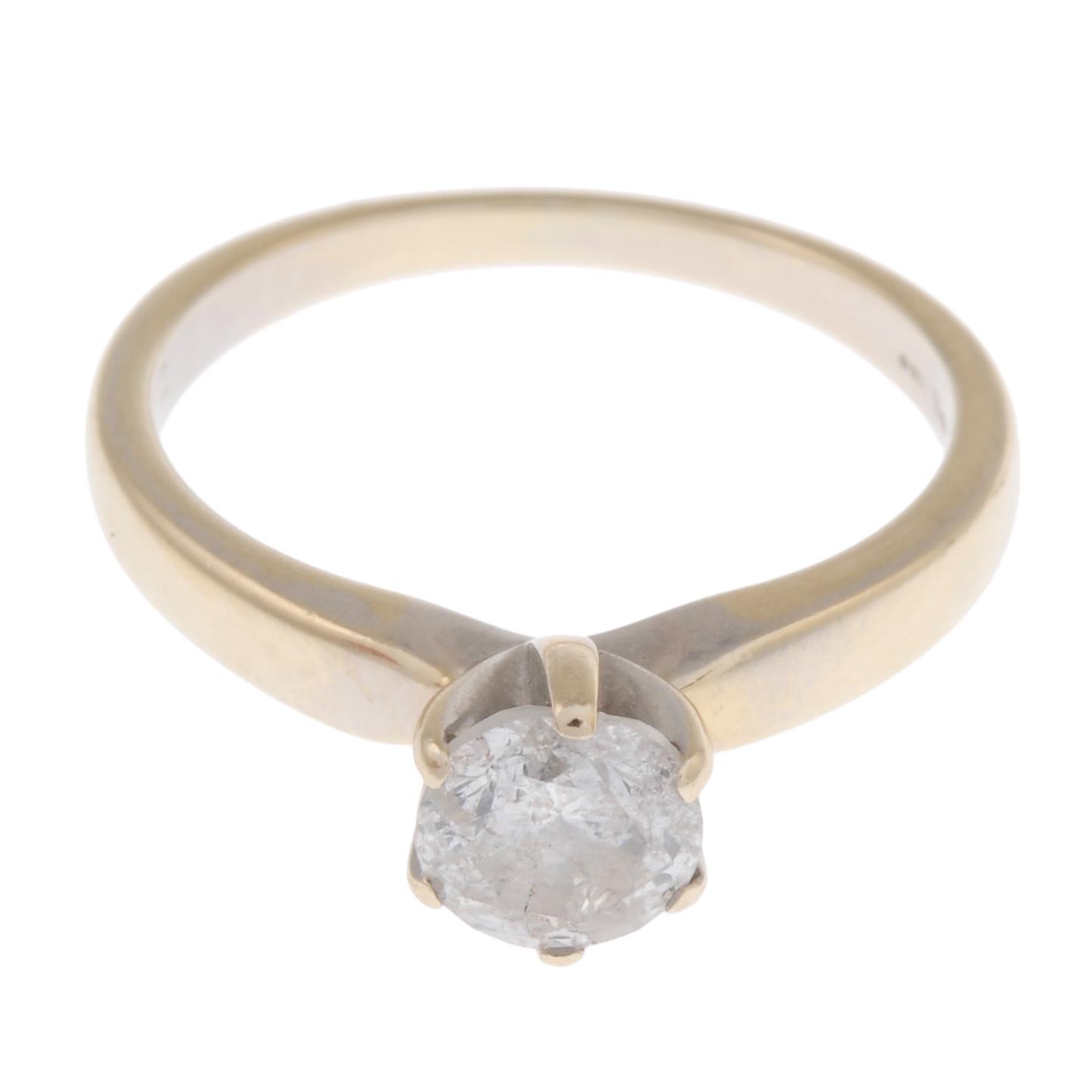 An 18ct gold brilliant-cut diamond single-stone ring.Diamond weight 0.82ct,