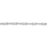 A diamond bracelet.Estimated total diamond weight 0.30ct.Stamped 375.Length 19.5cms.