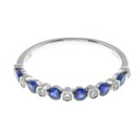 A sapphire and brilliant-cut diamond half eternity ring.Total sapphire weight 0.40ct,
