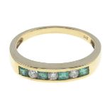 An emerald and diamond half eternity ring.Estimated total diamond weight 0.15ct.