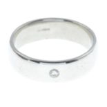 A platinum diamond single-stone band ring.Hallmarks for Sheffield.Ring size S.