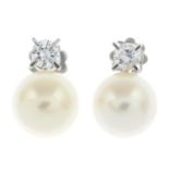 A pair of brilliant-cut diamond and cultured pearl earrings.With screw back fittings for