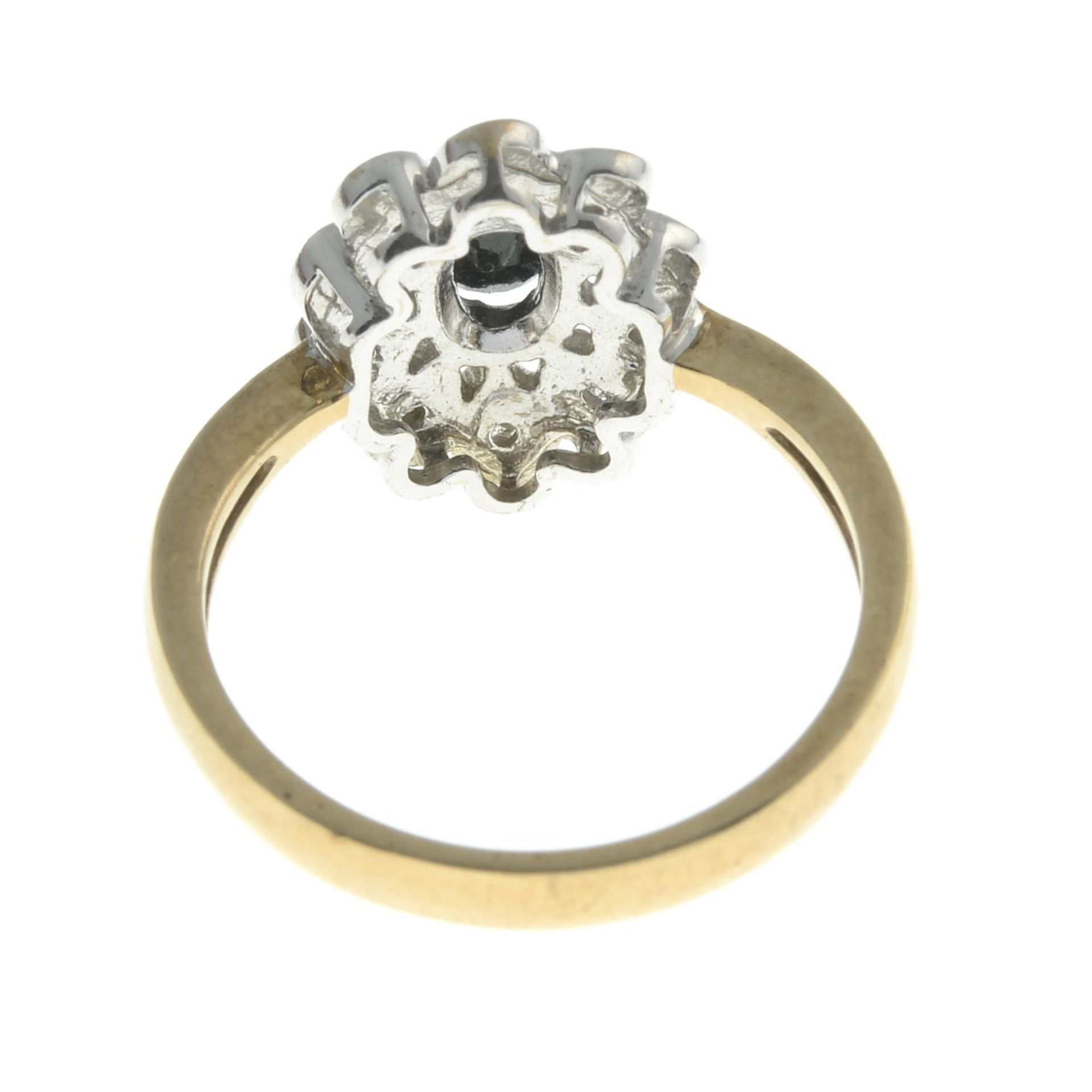 A 9ct gold sapphire and diamond cluster ring.Hallmarks for London.Ring size O1/2. - Bild 2 aus 2