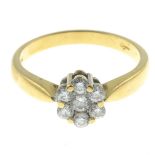 An 18ct gold brilliant-cut diamond cluster ring.Estimated total diamond weight 0.40ct.Hallmarks for