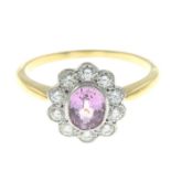 A pink sapphire and brilliant-cut diamond cluster ring.Estimated total diamond weight 0.40ct,